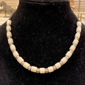 Black Corded Necklace with silver tone spacers and cream colored beads